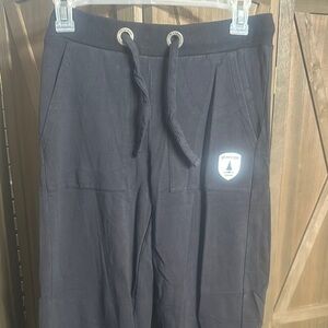Wanakome Black Joggers with Logo Patch.. never worn, new no tags.
